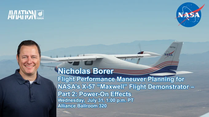 A smiling man wearing a dark navy polo shirt stands in front of a backdrop featuring a side-angle photo of a small, propellered aircraft in flight. 