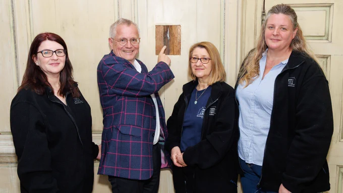 Prof Murray Pittock and Bannockburn House’s Amanda Monaghan, Anne Monaghan and Catherine Bradley take a close look at the bullet hole discovered in Bannockburn House.