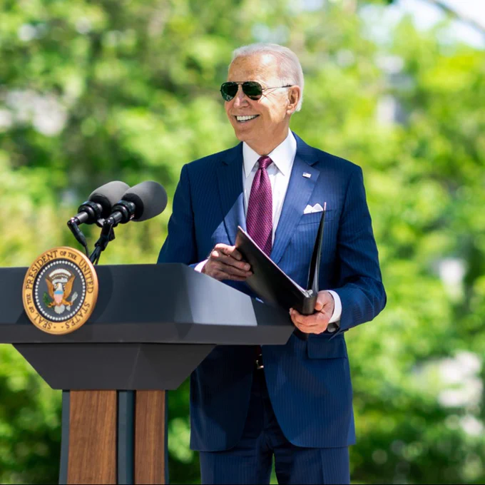 President Joe Biden, wearing aviators, makes remarks to the press on the North Grounds of the White House.