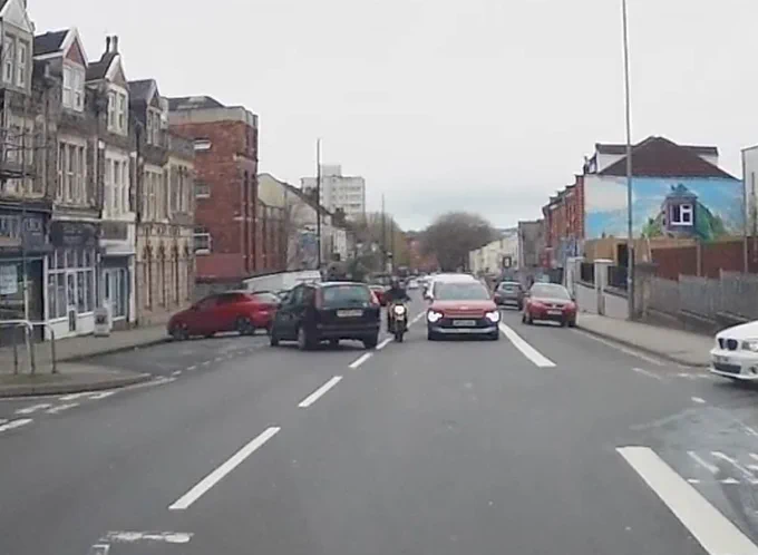 Evasive action by both drivers avoids a collision