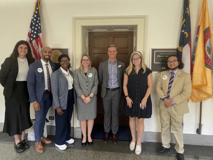 NAfME advocacy staff Amanda Karhuse with CEF staff outside Rep. Chuck Edwards' office with staff. 