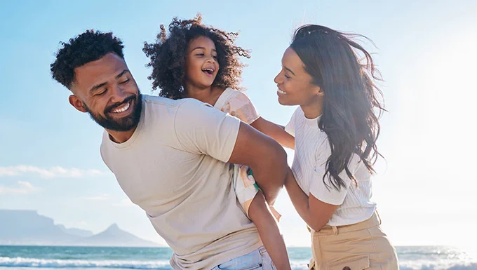 Photograph of a family on the beach