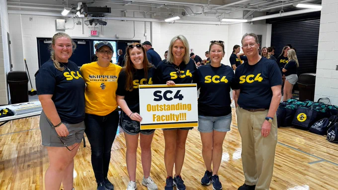 Pictured: SC4 President Kirk Kramer pictured with staff and athletes.
