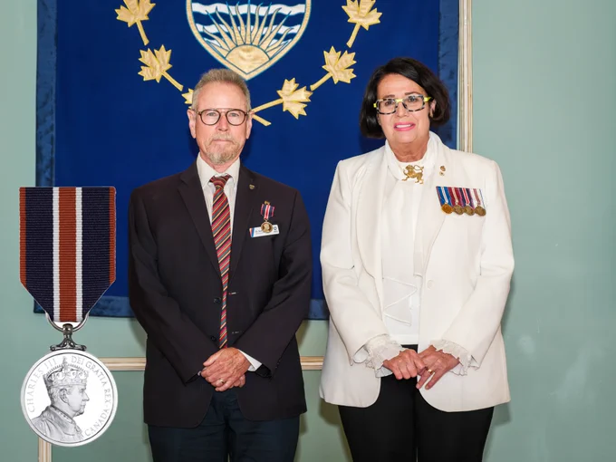 
Photo of Aaron Devor and Her Honour Janet Austin, BC's Lieutenant Governor at the Government House ceremony.  
