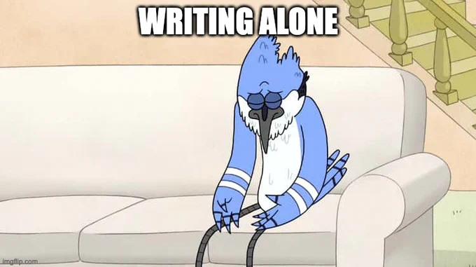 A caption reads "WRITING ALONE" and hangs over Mordechai from Regular Show who is slumped, wing/hands open on his knees, eyes shut, sitting on a couch, looking bummed.