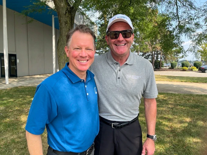 OOD Director Kevin L. Miller stands with Ryan Burgess, President and CEO for Goodwill Columbus.