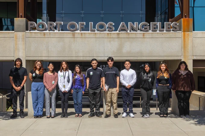 A group of EXP Summer interns in front of the Port of Los Angeles Harbor Administration Building