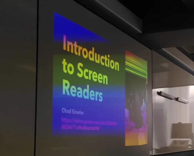 Slide saying "Introduction to Screen Reader, Chad Gowler". It looks like a rainbow effect has been applied. 