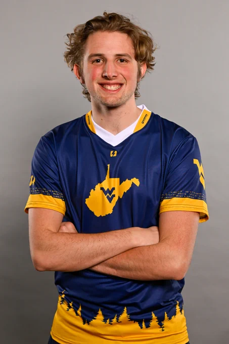 WVU Esports player Noah Johnson wears a WVU Esports jersey.