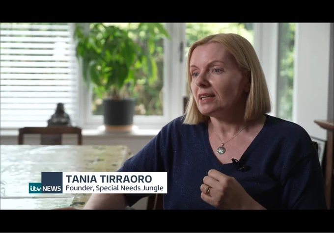 Image shows Tania Tirraoro in her dining room. She has a blonde straight bob and a blue top. She’s a bit cross