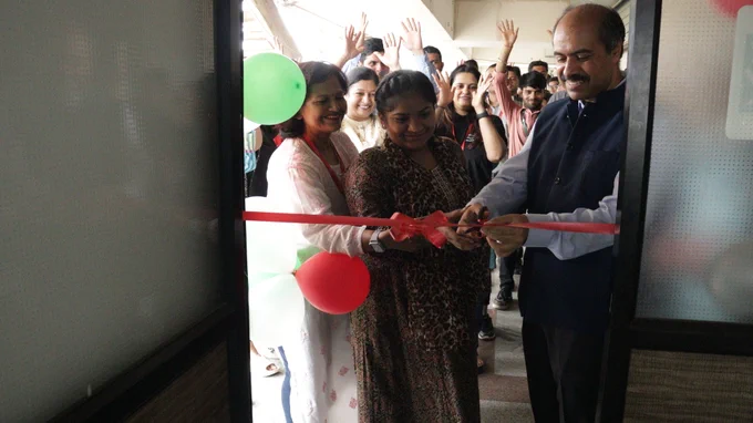 Chetan Kapoor, CEO of TMF, and Sangeeta Bhowmick, IBU Head, Digital Engineering Services, Tech Mahindra, cutting the ribbon and launching the SMART  centre at Ahmedabad.