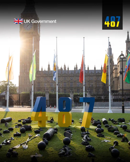 Image of installation in Parliament Square featuring the number "487" in the colours of the Ukrainian flag surrounded by sports equipment.