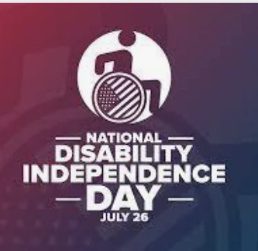 A red, white, and blue graphic with a wheelchair symbol in the center and text that reads "National Disability Independence Day - July 26".