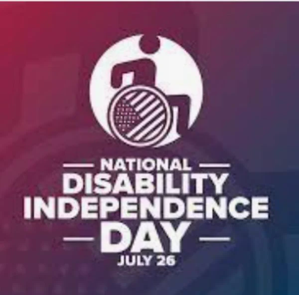 A red, white, and blue graphic with a wheelchair symbol in the center and text that reads "National Disability Independence Day - July 26".