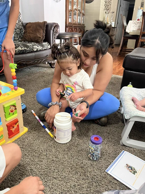 During a PAT visit  with Mrs. Gutierrez had mom read a book with to the children and then played a game called chips in a can.
#finemotoractivity #readtome #parentsasteachers #family #FamilyFun #familia #pat #dph