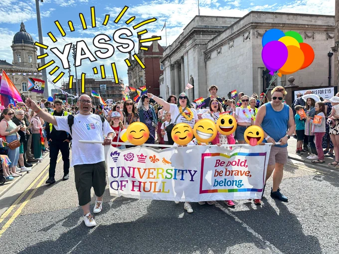 University of hull staff, students and their family taking part in Hull Pride - the university logo is rainbow, and the banner says: be bold, be brave, belong.