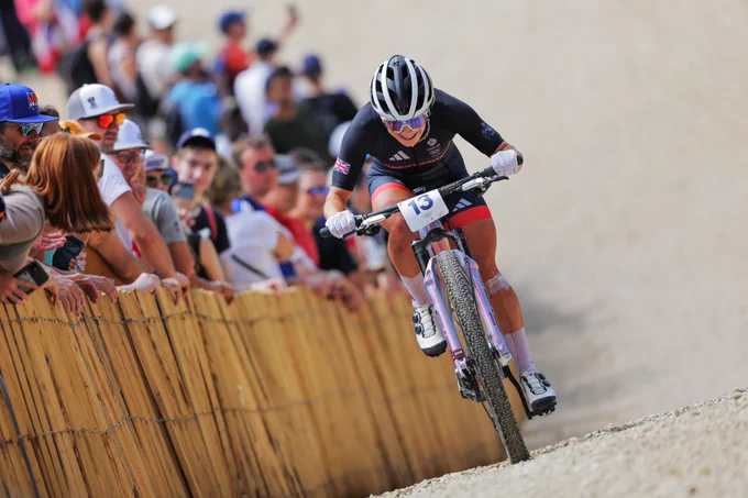 Evie Richards works her way up the climb on the XC course