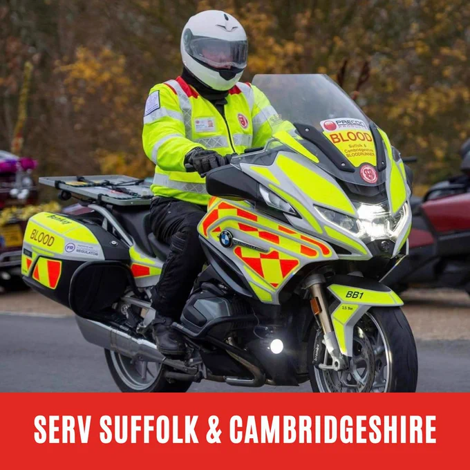 person riding a motorbike wearing a high viz jacket