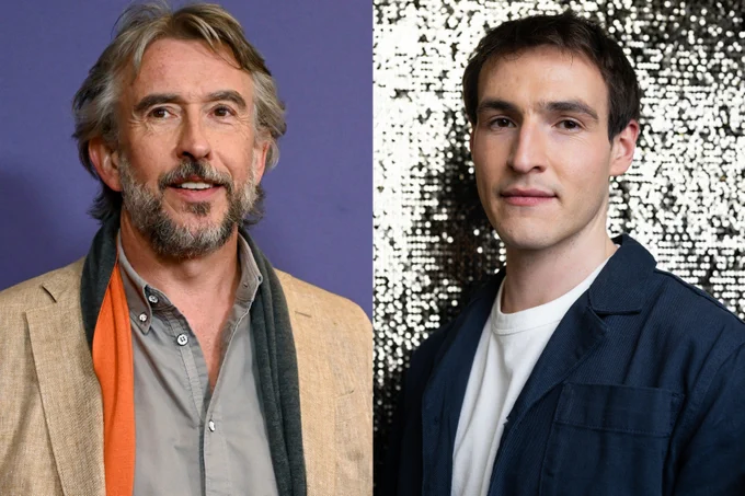 Side-by-side shot of Steve Coogan against a purple background wearing a pale brown jacket, black and orange scarf and grey shirt, and Éanna Hardwicke in front of a silver glittery background wearing a dark blue jacket and white T-shirt.