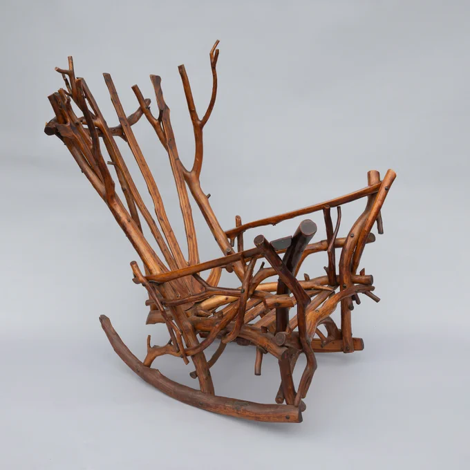 Adirondack Branch Style Rocking Chair
c. 1925
Clarence O. Nichols (1869 to 1950)
Cedar, 52 x 45 x 52
Gift of Mr. and Mrs. Howard Stewart