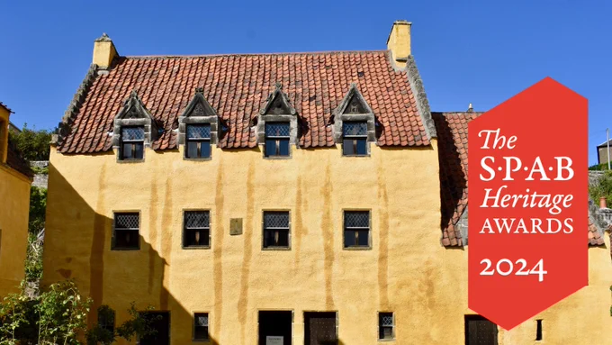 A photo of Culross Palace with a red logo saying The SPAB Heritage Awards 2024
