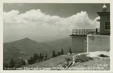 Photo credit: UNC Libraries Commons. 1940-1950. "View from the Radio Tower on Mt. Mitchell, Western N.C." Flickr. https://flic.kr/p/B9S7NC