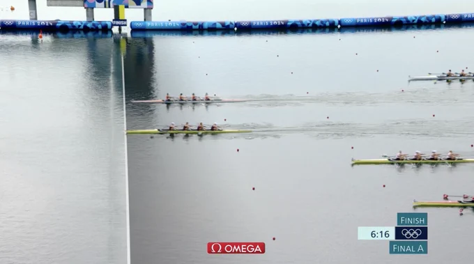 Rowing with Team GB touching the final line and Netherlands just behind.