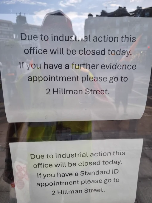 a notice on the jobcentre door saying it is closed due to industrial action 