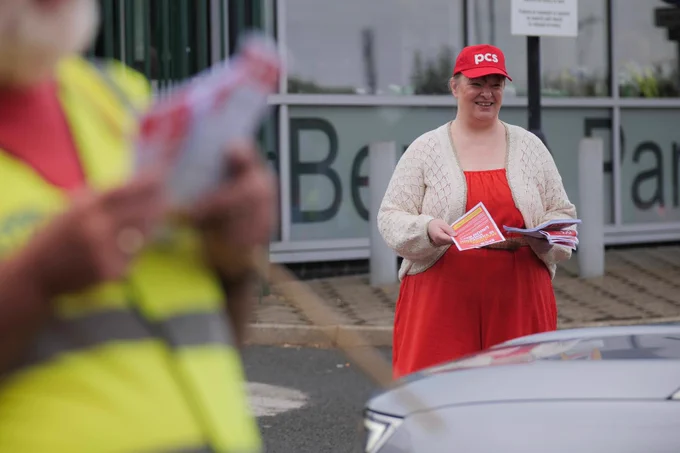 Member handing out leaflets 