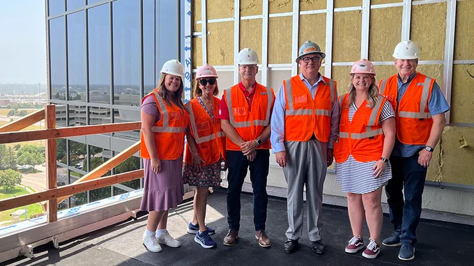 OU Vice President for Research and Partnerships Tomás Díaz de la Rubia (fourth from left), OADII Executive Director General (ret) Robin Rand (far right), and members of the VPRP/OADII team tour the 8th floor of Convergence
