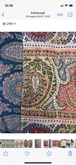 Patchwork pieces of Paisley shawl on a bedspread