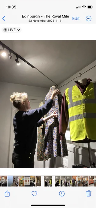 Vicky prepares a 1970s suit for display