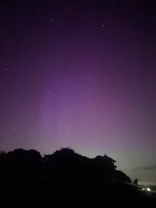 Lady aurora over dundrum castle