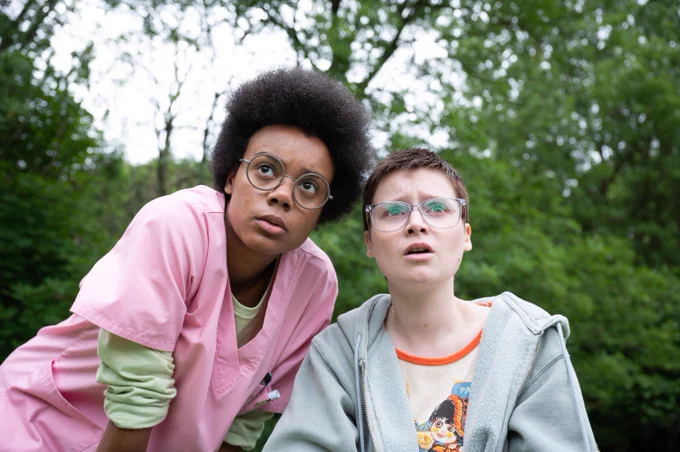 Still from Tuesday showing teen and nurse looking shocked.