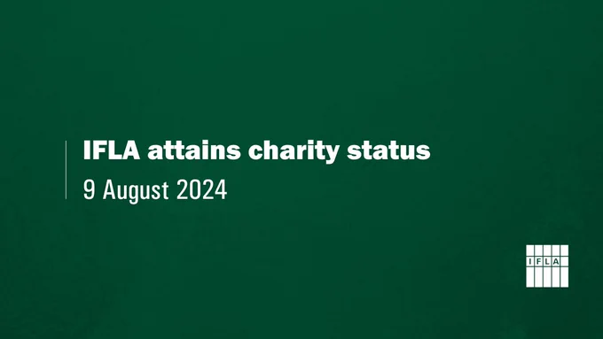 Picture of a green background. Text: IFLA attains charity status