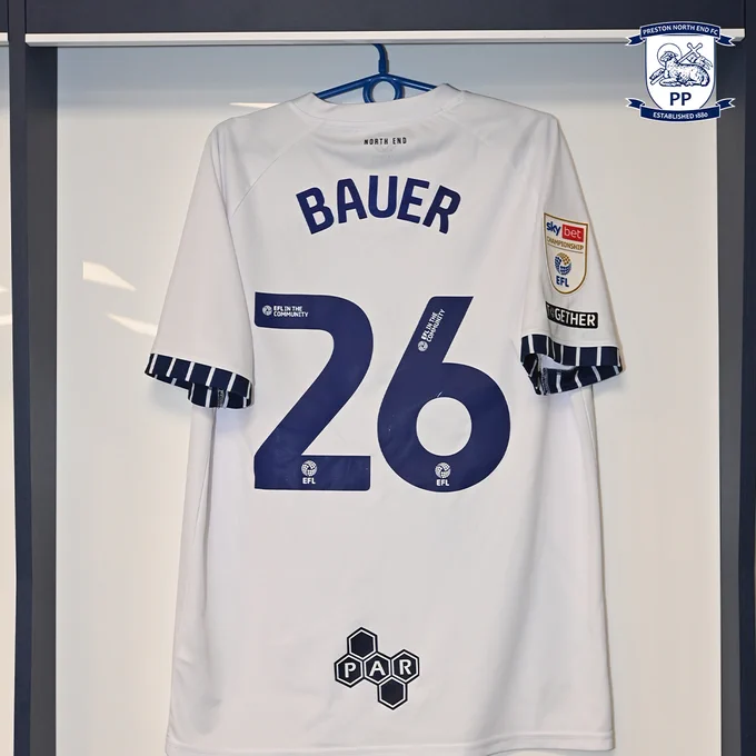A Bauer 26 shirt hanging in the dressing room.