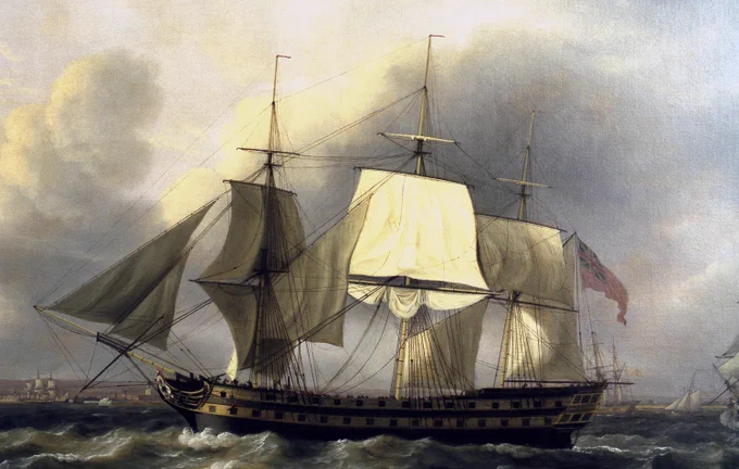 A painting of a large historic ship at sea. 