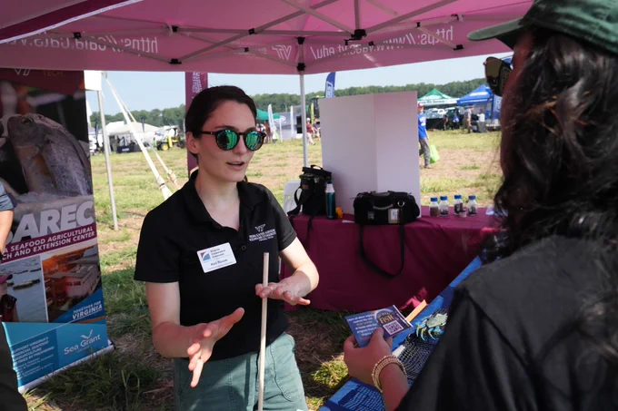 Keri Rouse shares information about the invasive blue catfish and Extension programs at the Virginia Ag Expo.