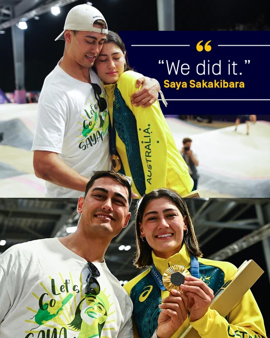Two people embrace with words "We did it"