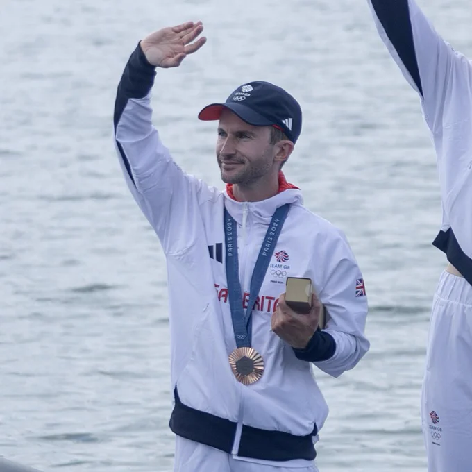 Henry Fieldman with his bronze medal from Paris 2024 in the women’s eight rowing final.
