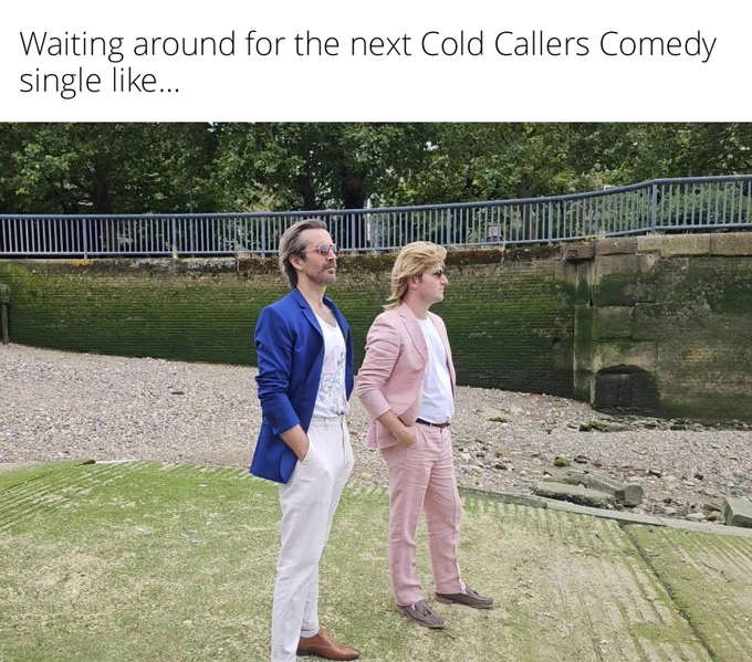 The muso-comedy duo, Ryan & Paul, standing on a beach, looking off into the distance