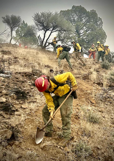 Cutting or digging line is one of the hardest tasks in all of firefighting. It takes both physical and mental toughness to keep working all day in hot, dusty, and generally unfavorable conditions.


Taskforce 15 out of Yamhill County seen here, cut approximately 2 miles of line. Credit: Andy Parker