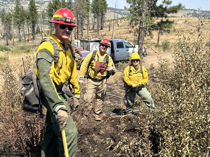 Proud of successfully mopping up yet another hotspot on the Durkee Fire, firefighters take a moment to pause for a Public Information Officer to snap a quick picture. (Photo by Brook Smith, Southern Area Gold Team)