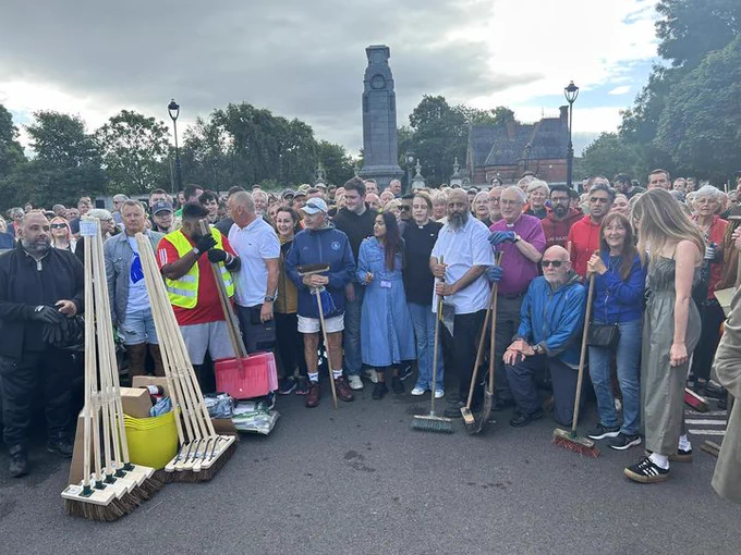 A very large crowd of people of different ethnic backgrounds, different faiths all coming together to clean up the mess on Middlesbrough streets after the riots yesterday. The photo is from Teesside Connected on facebook.