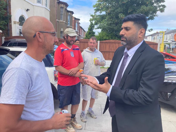 Lord Khan meets volunteers at Southport Islamic Centre Mosque.