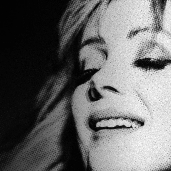 A black and white photo of Christine Bovill smiling