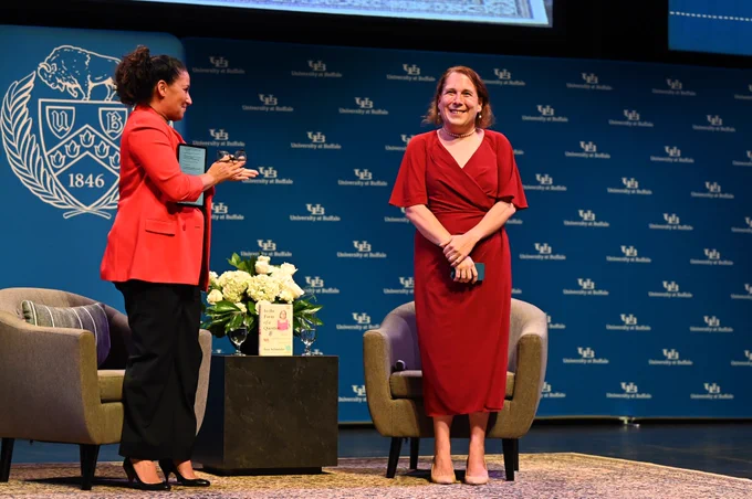 Amy Schneider and moderator, Dr. Kyla Tompkins onstage at UB's Center for the Arts.