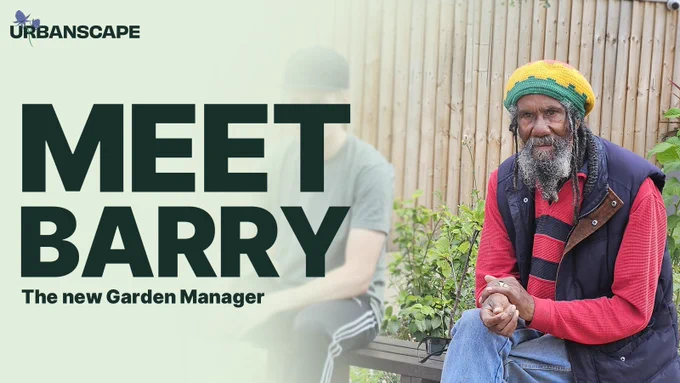 Barry seated on bench in UrbanScape Community Garden. 