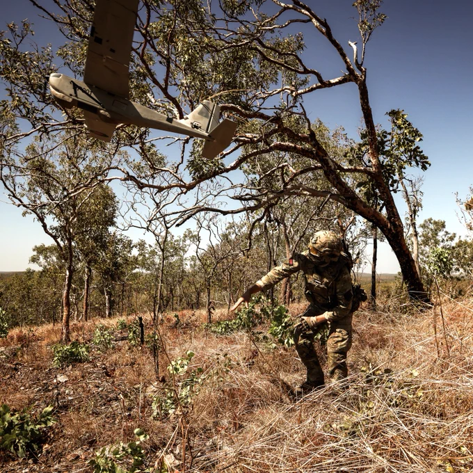 A Royal Marine launches a Puma RPAS during Exercise Predators Run