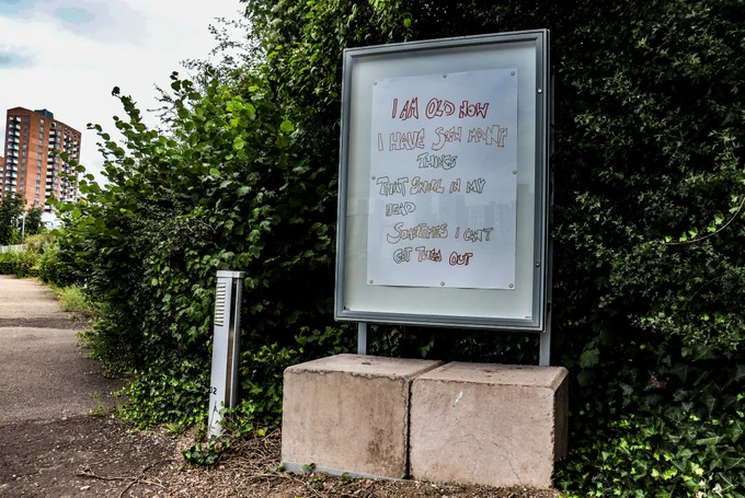 The work on display reads "I am old now ⁠
I have seen many things that swirl in my head⁠
sometimes I can't get them out"⁠